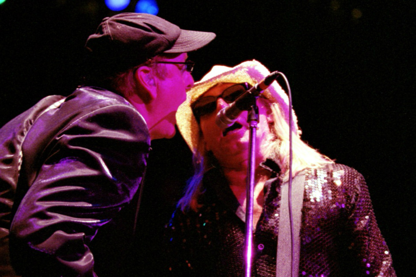A man is singing into a microphone.