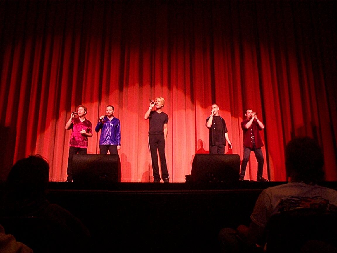 A group of people on stage.