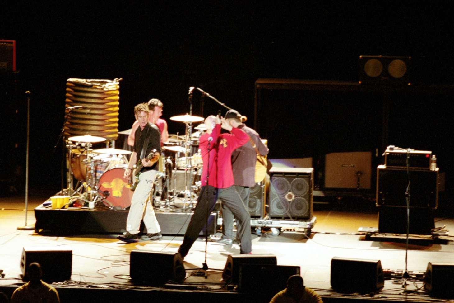 A group of people standing on a stage.